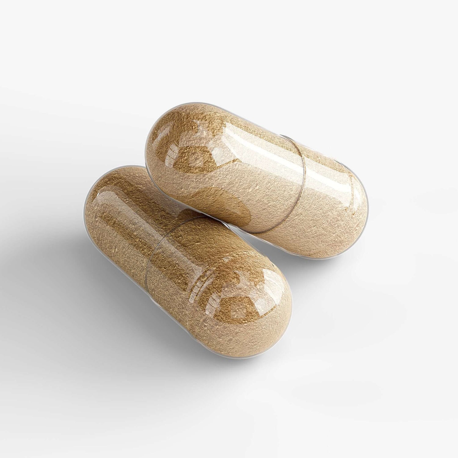 Two Ayurvedic wellness capsules featuring a shiny, smooth surface with a natural herbal blend.