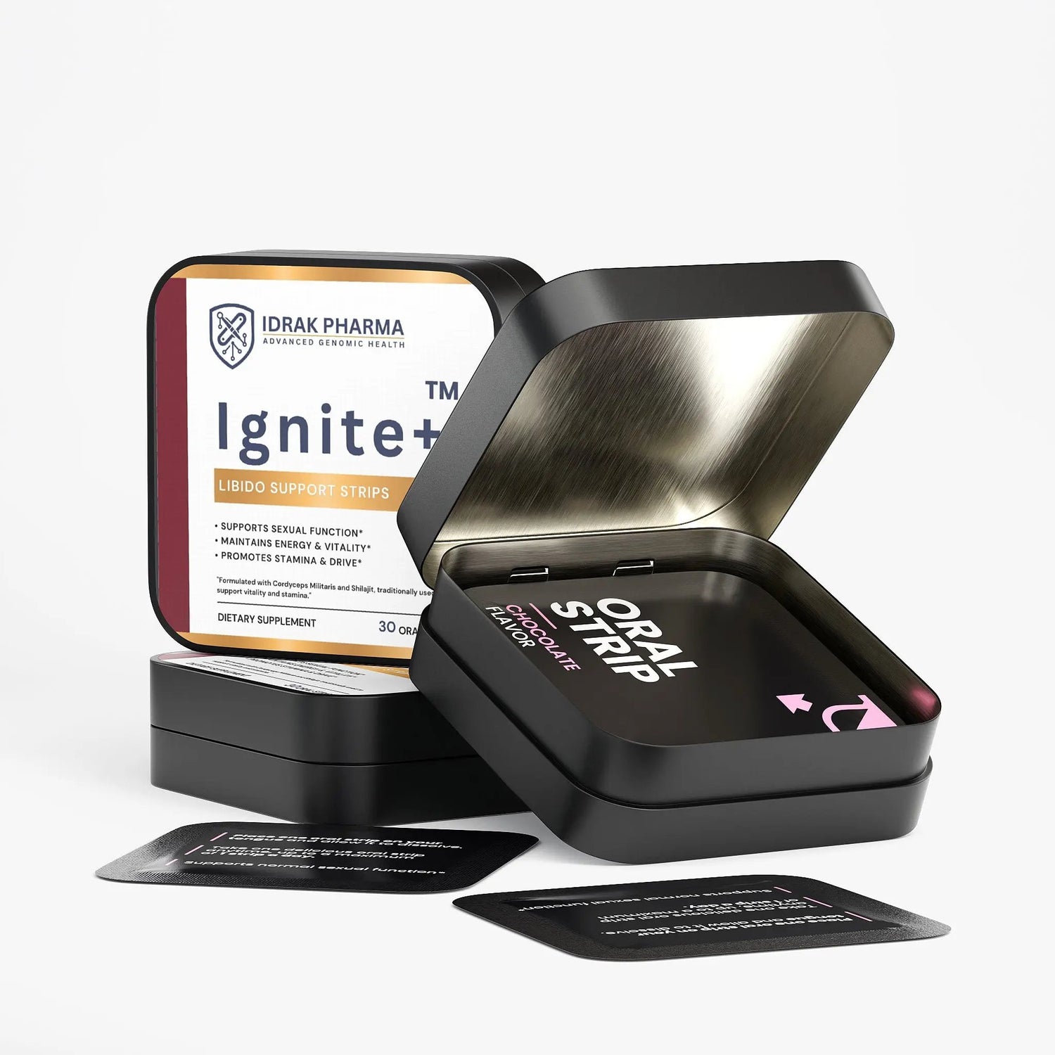 An open black metal tin of Idrak Pharma Ignite+ oral support strips, with a closed tin behind it and two small instruction cards in front, photographed on a clean white background.