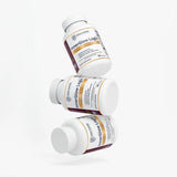 Three InnerGlow Logic™ ACV Probiotic & Prebiotic Gut Health Capsules bottles stacked together by Idrak Pharma