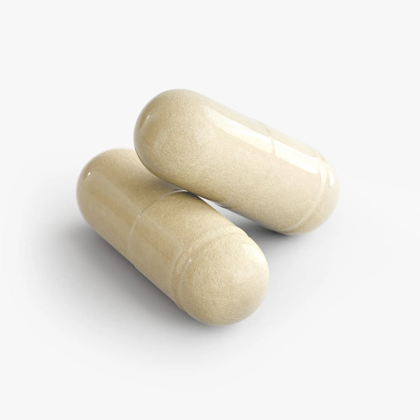 Close-up of two InnerGlow Logic Gut Health Probiotic capsules