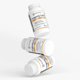 Three bottles of Longevity Core Ayurvedic Wellness Capsules stacked together