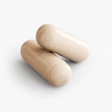 Close-up of two Zen Mode Ashwagandha capsules